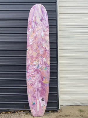 Lorem ipsum dolor sit amet, consectetur adipiscing elit, sed do eiusmod tempor incididunt ut labore et dolore magna aliqua. Leboss Surfboards photo of a longboard - Kenny Loggins