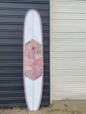 Lorem ipsum dolor sit amet, consectetur adipiscing elit, sed do eiusmod tempor incididunt ut labore et dolore magna aliqua. Kenni Loggins Surboard - deck view